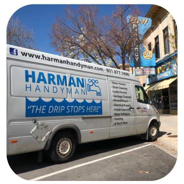 Harman Handyman van outside of commercial shopping center